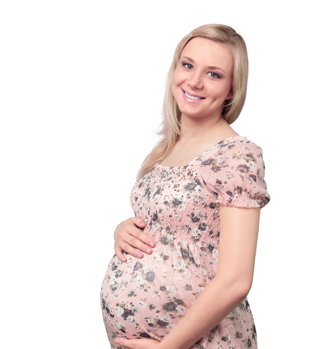 A happy pregnant woman gently holding her belly, symbolizing early motherhood and emotional connection